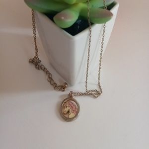 Cream/ gold paded horse necklace